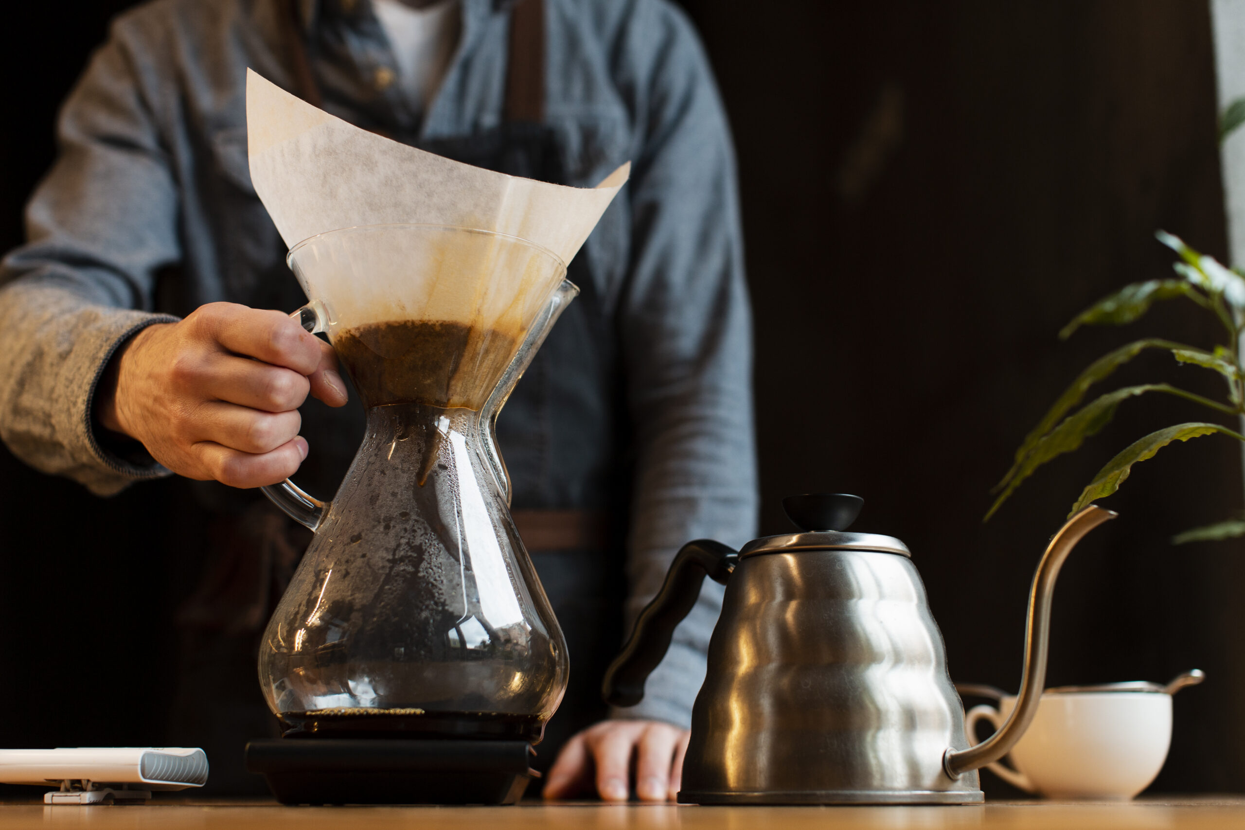 close-up-man-holding-coffee-filter